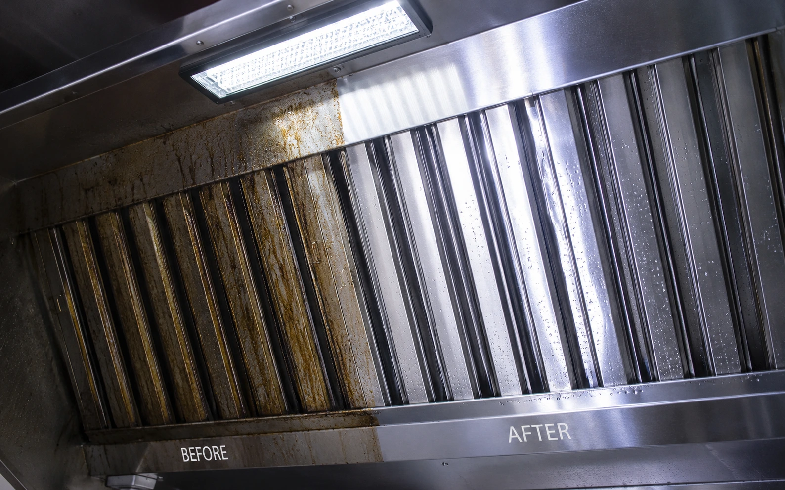 Commercial rangehood, canopy and filter degreasing in a Sydney restaurant kitchen